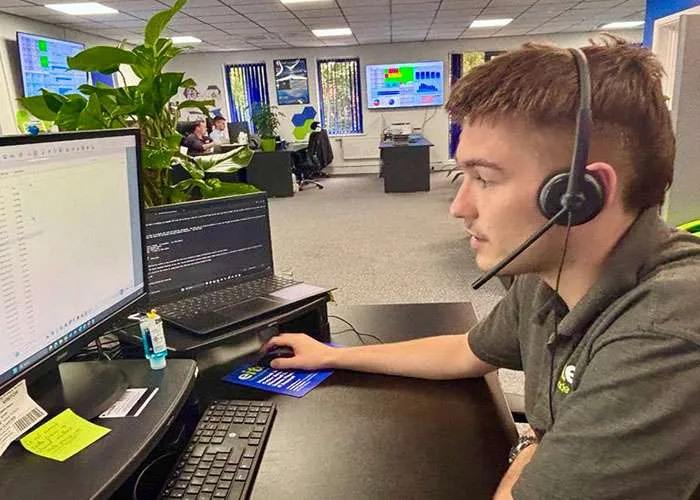 A image of a IT helpdesk technician